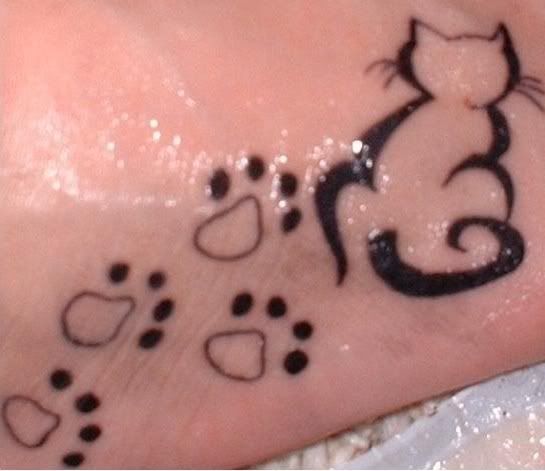cattrailtat.jpg Tattoo-cat outline and paws