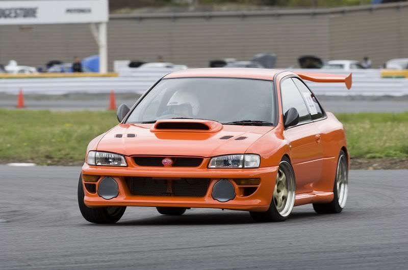 http://i296.photobucket.com/albums/mm169/silverf4turbo/subaru%20japan/orangecoupe1.jpg