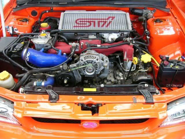 http://i296.photobucket.com/albums/mm169/silverf4turbo/subaru%20japan/orangecoupe2.jpg